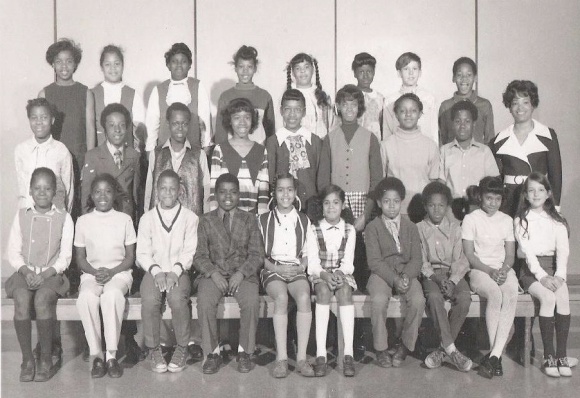 I sometimes write on race and occasionally people ask me where I get off writing about race. Well, this is my fifth-grade class picture. I'm at the far right in the first row. That's pretty much what all my classes looked like from the fourth grade through high school. 